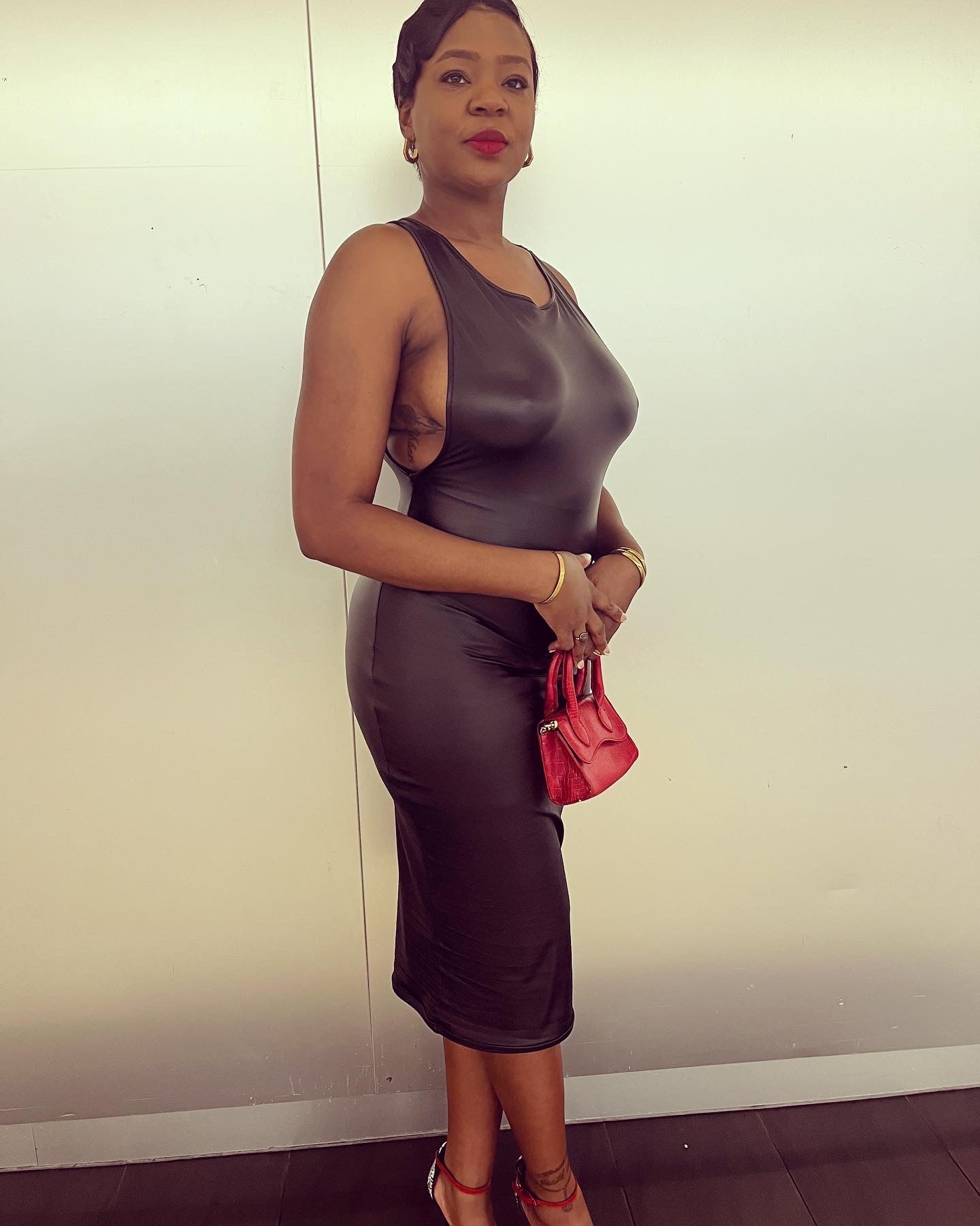 BLACK BACKLESS PU LEATHER BODYCON DRESS Urban Roses BLACK BACKLESS PU LEATHER BODYCON DRESS Urban Roses